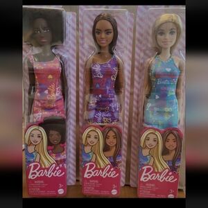 Barbie Doll in Blue, Pink,And Purple Barbie Logo Print Dress. Lot Of 3 New